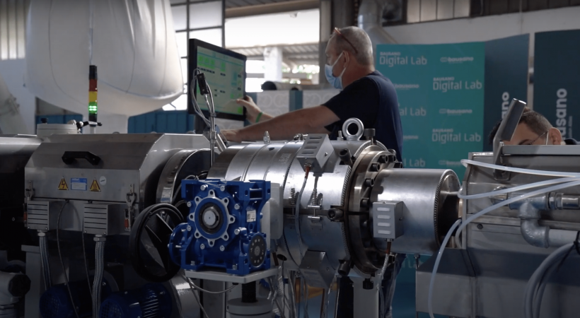 A Bausano Employee demonstrate an extrusion line